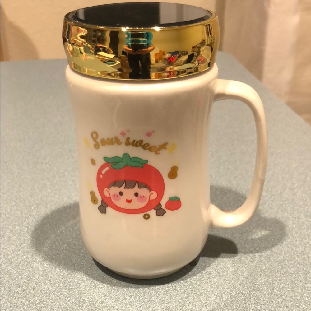 Gold and White Ceramic Mug with Cute Design